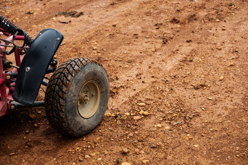 Off road buggy tire on dirt road