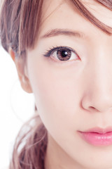 closeup young woman face with clean skin