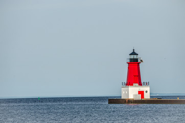 Fototapeta na wymiar Red Lighthouse at Menominee Pierhead