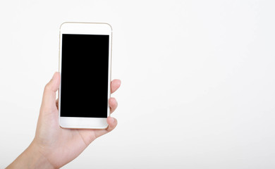 Woman hand holding smartphone with blank screen isolated on white background.