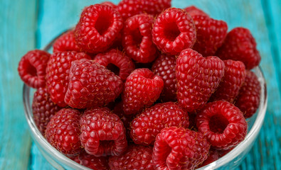 Fresh raspberry in a glasses bowl