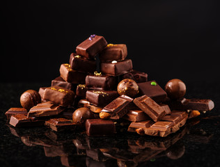 Mountain of chocolate and chocolates candys.