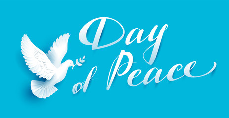 Day of Peace lettering text for greeting card. White dove with branch symbol of peace