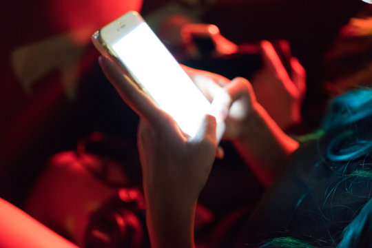 Woman Texting In Rideshare