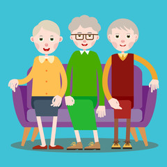 Three seated elderly women