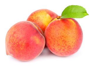 Peach. Fruit with green leaf isolated on white background
