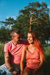 Smiling couple in love, outdoors, having joyful moment together