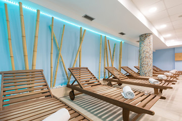 Sunbeds in hotel swimming pool