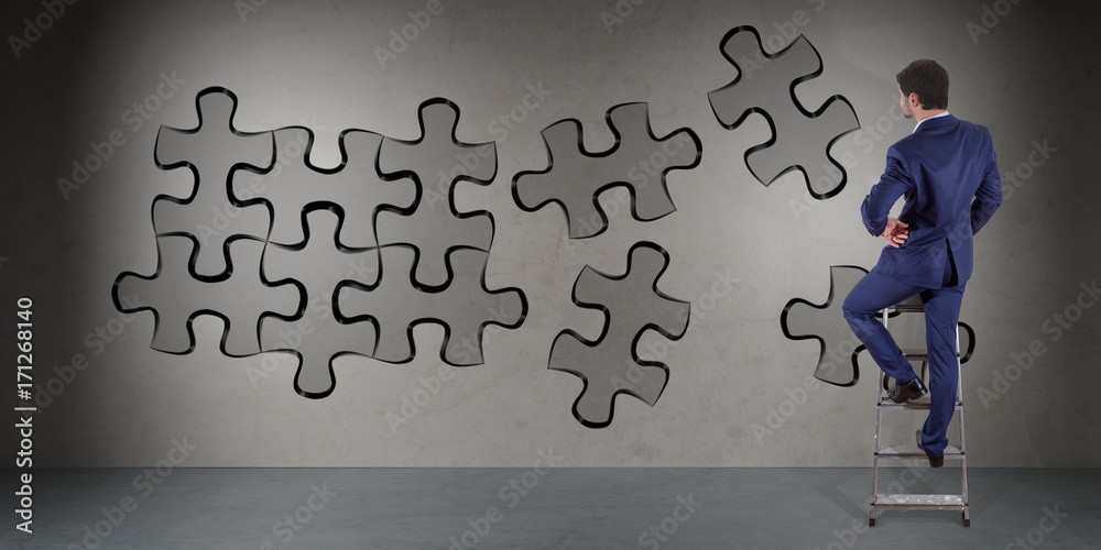 Poster Businessman searching puzzle solution on a wall 3D rendering