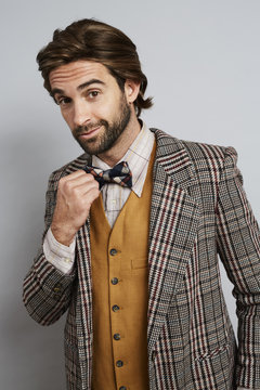 Geek guy fashion in bow tie and jacket, portrait