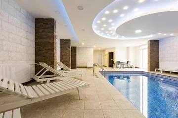 Fotobehang Indoor swimming pool in hotel spa center © rilueda