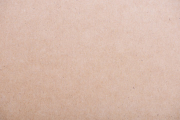 Brown textured cardboard background.