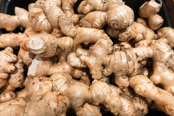 Pile of fresh ginger root.