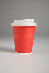Paper cups on gray background