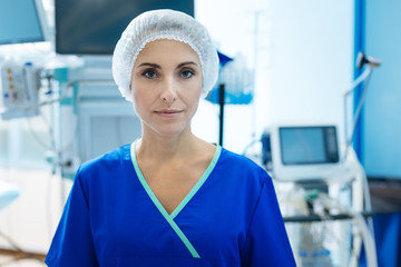 Fototapeta premium Serious nurse looking straight at camera