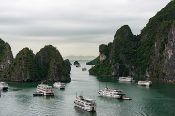 Fototapeta na wymiar Aerial view on Halong bay with cruise ships and boats