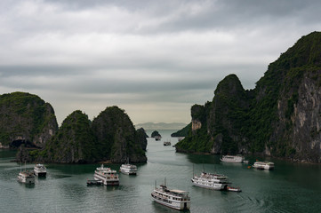 Fototapeta na wymiar Aerial view on Halong bay with cruise ships and boats