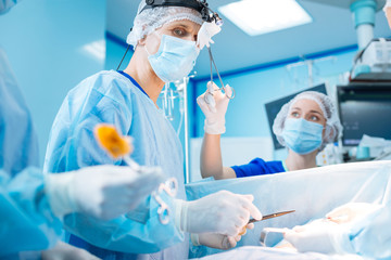 Competent doctor looking straight at table