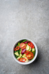 Fototapeta na wymiar Fresh vegetables salad. Top view