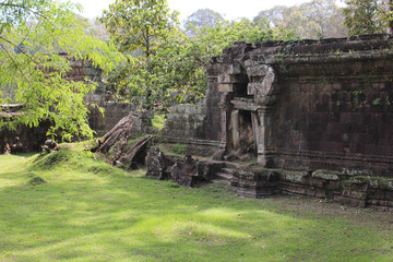 Ruins and walls of an ancient city in Angkor complex, near the ancient capital of Cambodia - Siem Reap