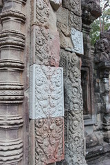 Sculptures on the ruins of the ancient complex of Angkor, Cambodia