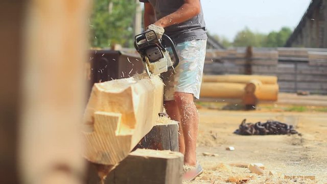 Saw sawing wood for home