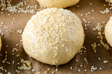 Homemade hamburger rolls, raw dough.