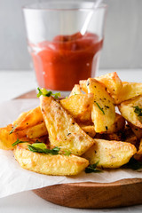 Potatoes on rustic tomato sauce.