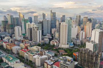Fototapeta na wymiar Makati Skyline at sunset. Makati is a city in the Philippines