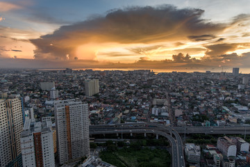 Fototapeta premium Metro Manila Skyline at Sunset , Philippines