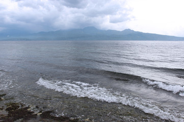The sun is reflected in the calm ocean. Philippines