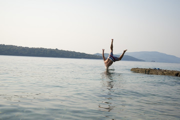A man jumping into the water