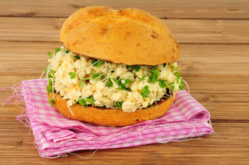 Fresh scrambled egg and cress sandwich in a crusty bread roll