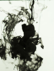 Fototapeta na wymiar black ink drop in water 