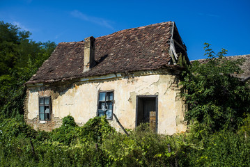 Fototapeta na wymiar Old ruined abandoned house