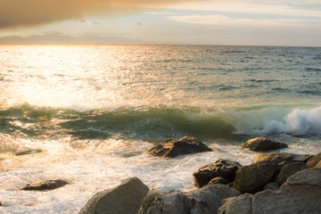 The sea at sunset in a bad weather day
