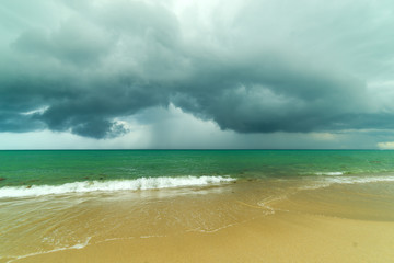 ocean wave and sandy beach