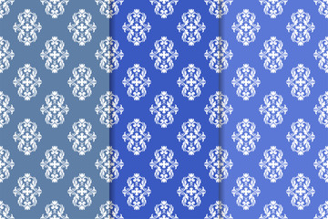 Set of floral ornaments. Blue vertical seamless patterns