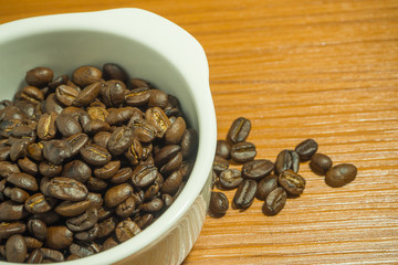 The white coffee  cup on wood table top view