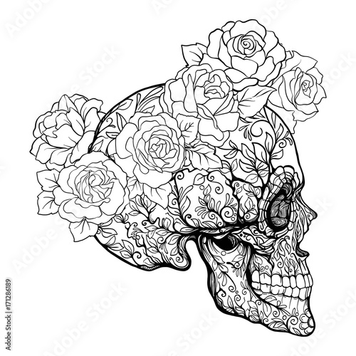 "Sugar skull with decorative pattern and a wreath of red ...