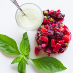 vegetarian salad with vegetables and greens on a plate closeup