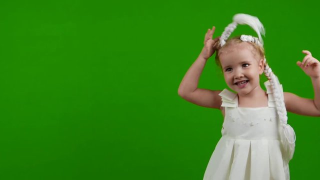 little girl is dancing green screen