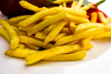 Golden French fries potatoes ready to be eaten
