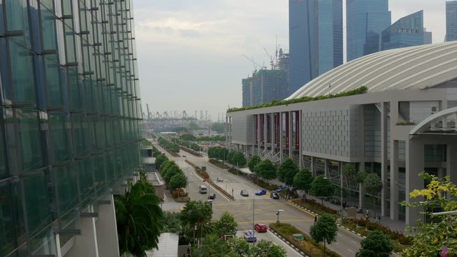 famous singapore marina bay sands hotel bridge traffic road flyer panorama 4k 
