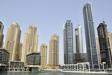 Obraz na płótnie Canvas Tall buildings in Dubai, United Arab Emirates