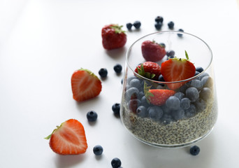Chia seed pudding with fresh berries, healthy breakfast concept, selective focus