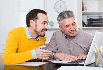 Men look interesting in computer