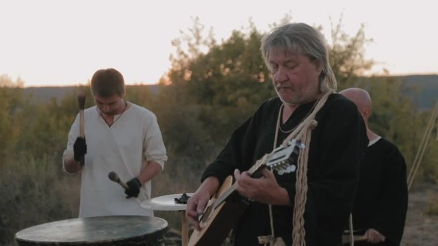 Perfomance medieval ensemble of monks Templars