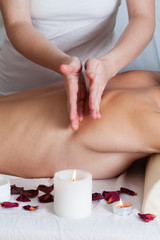 Obraz na płótnie Canvas Back massage of a woman close up