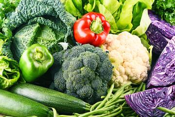 Composition with variety of raw organic vegetables.